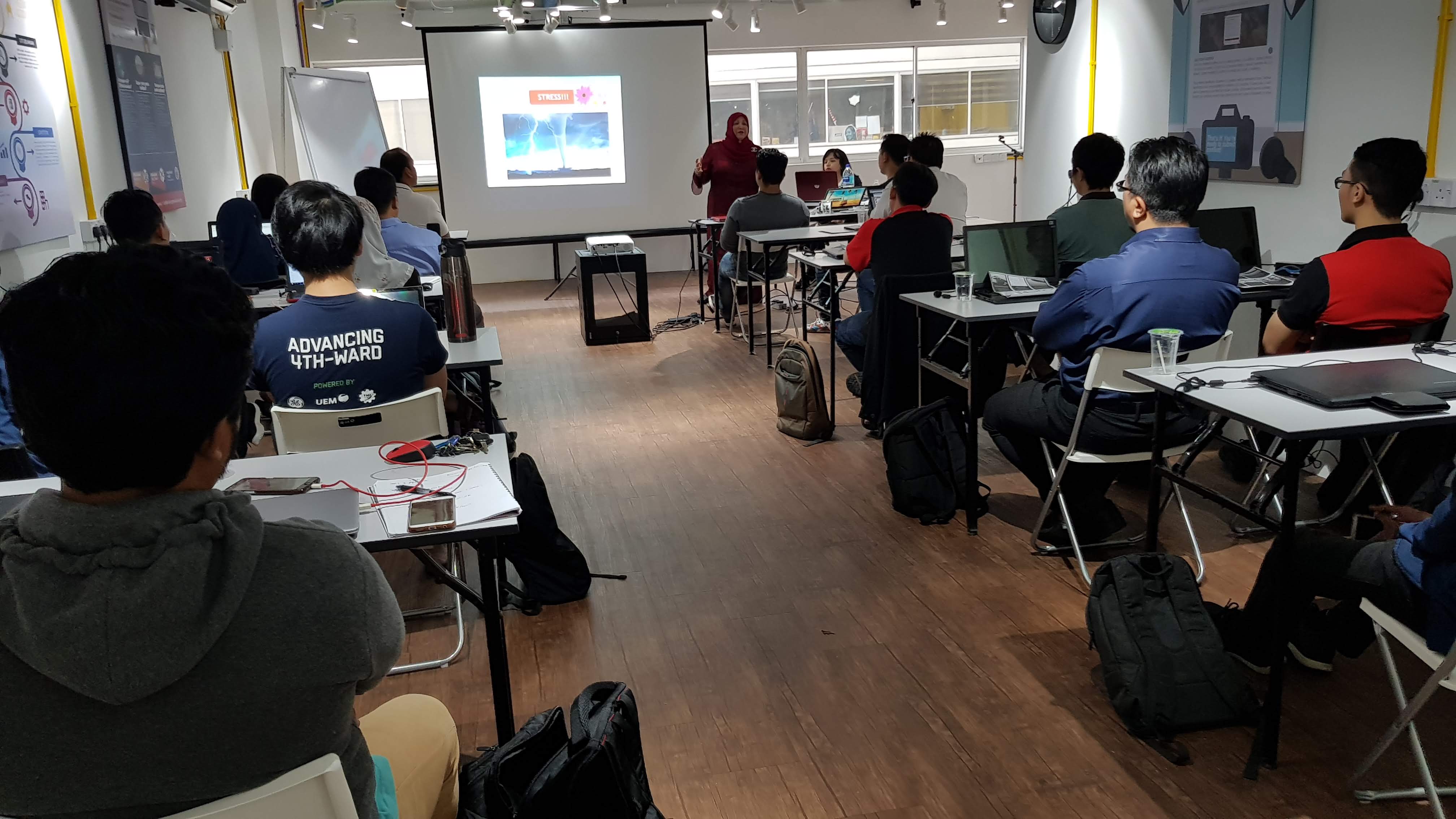 TFX Consulting training session with instructor and students